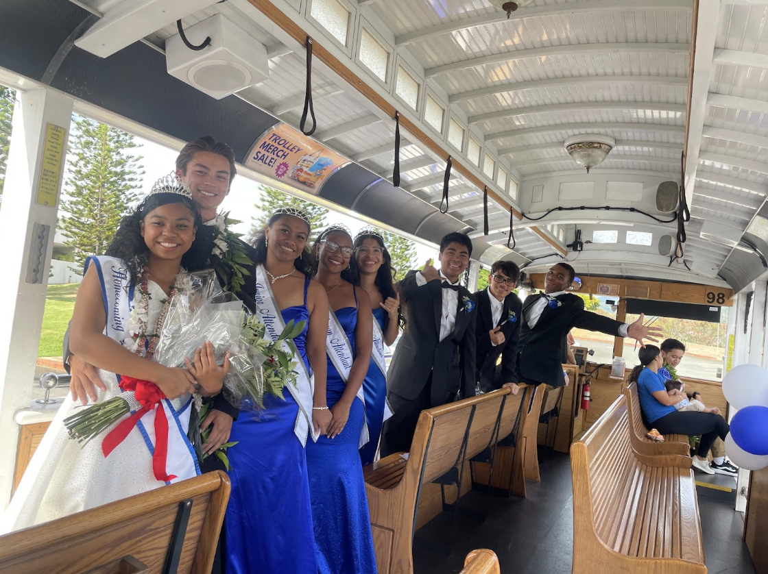 Our 2024 Homecoming court king, queen, escorts, and attendants rode together on a trolley with Mr. Zavala, the 2024 teacher of the year.